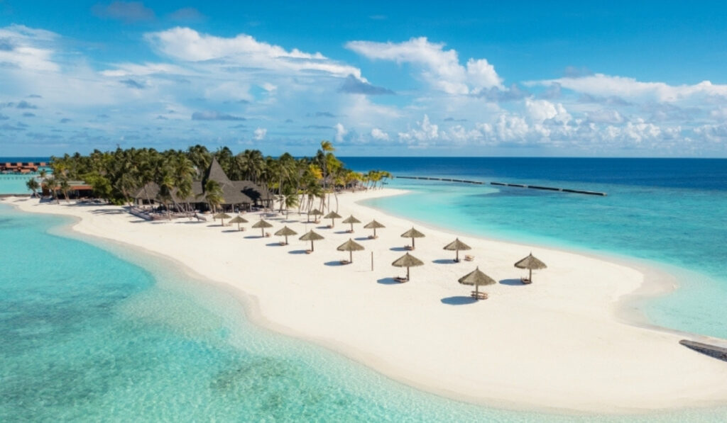 Long sand bank of Veligandu Maldives Resort island